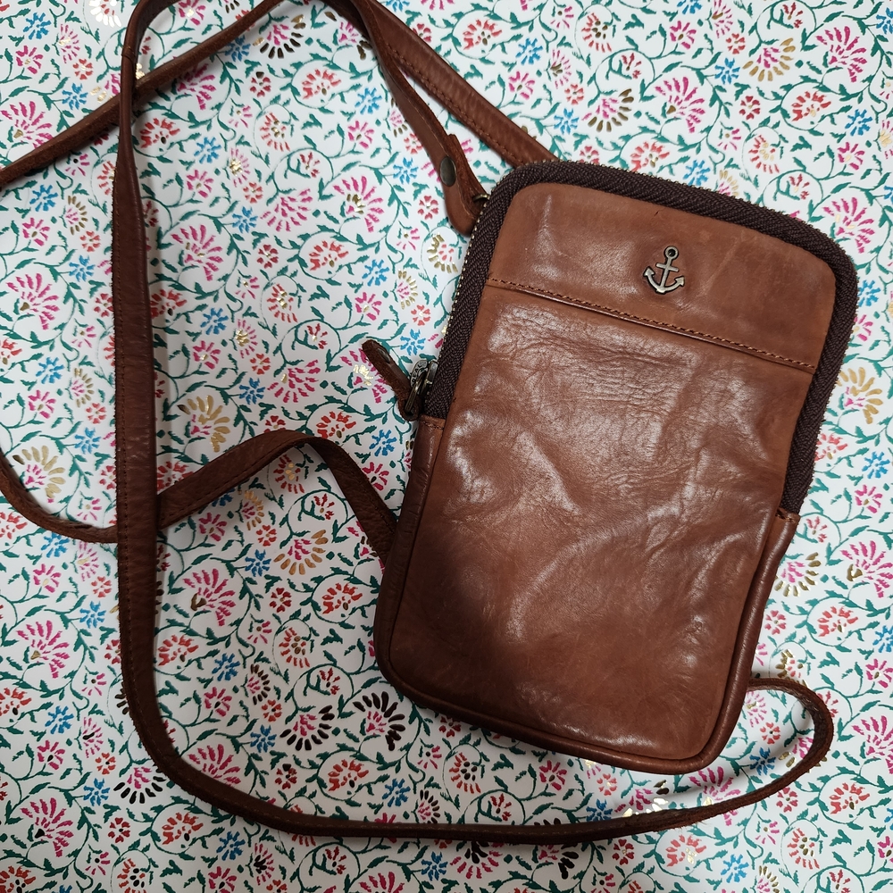 Elegant Brown Leather Crossbody Bag with Anchor Detail
